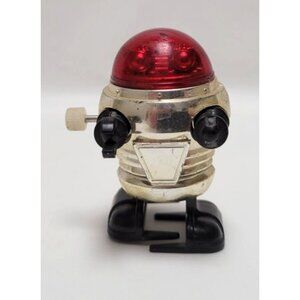 Vintage 1977 Tomy 2" Plastic Wind-Up Robot Toy Red Dome Black Feet